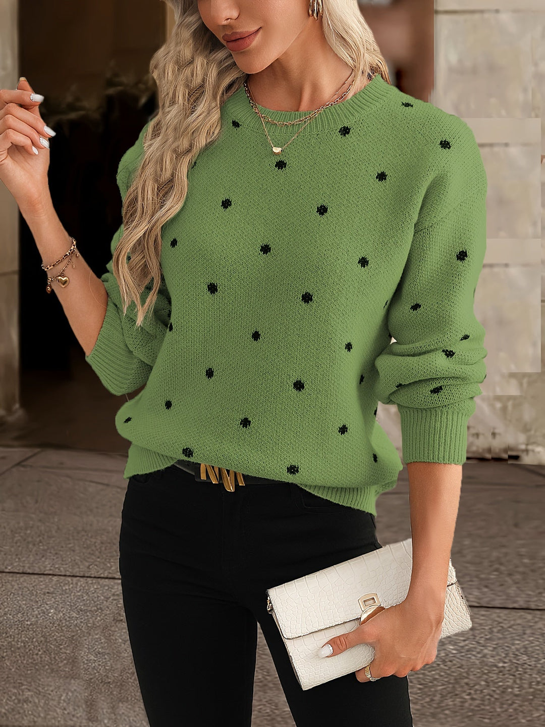 Autumn/winter women's long-sleeve polka dot sweater. Cozy round neck knit for chic comfort.