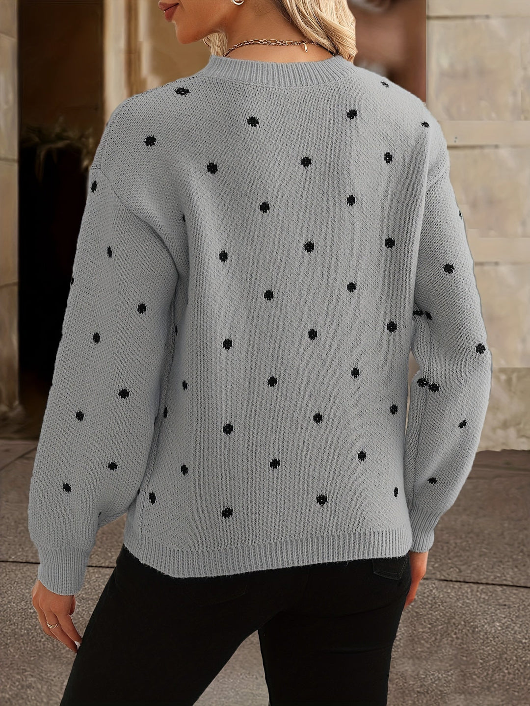 Polka dot women's cozy knit sweater. Long-sleeve, round neck for autumn & winter style.