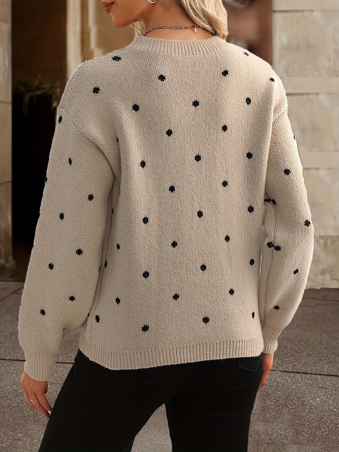 Women's cozy round neck polka dot sweater. Essential autumn/winter long-sleeve knitwear.