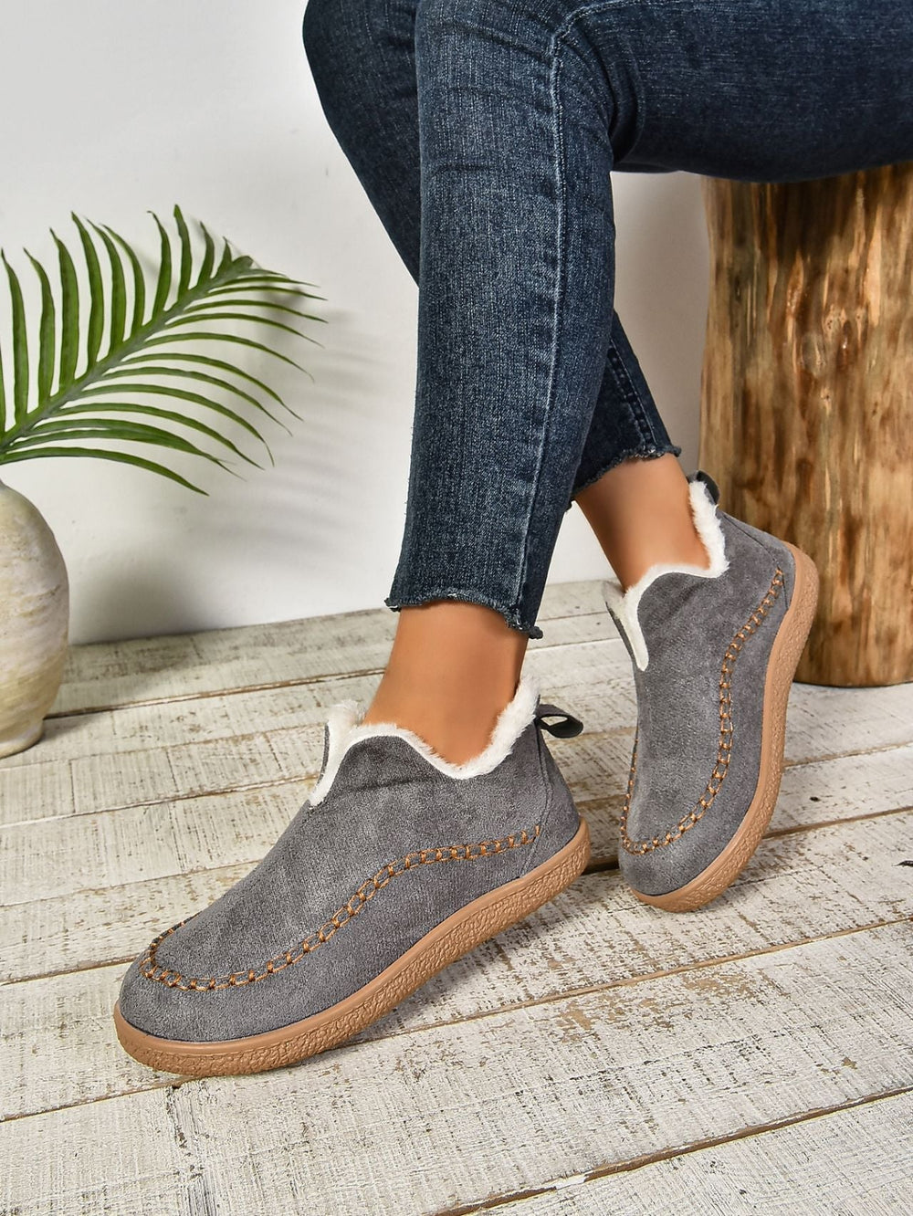 Comfortable women's house shoes, slip-on style with plush warm lining, perfect for indoor relaxation.