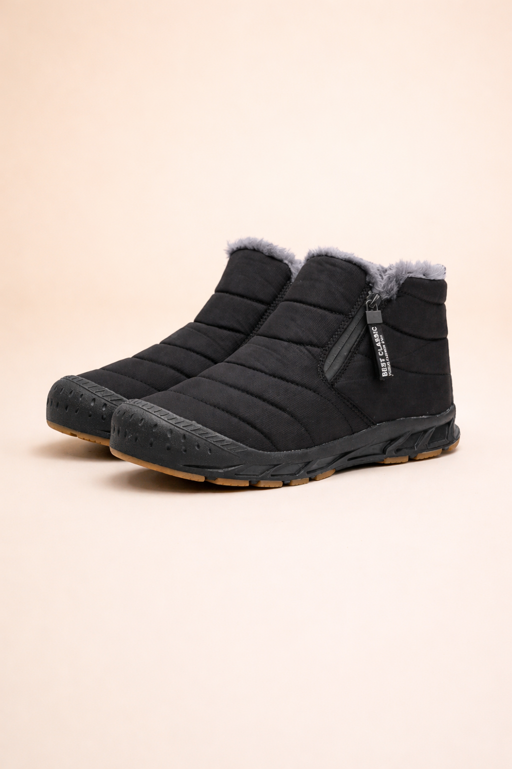 Stylish women's snow boots with secure zip closure, waterproof and warm for ultimate winter comfort.