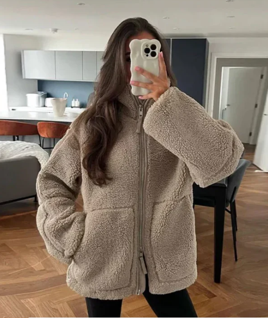 Versatile women's casual zip-up winter jacket, providing warmth and style for fall and winter seasons.