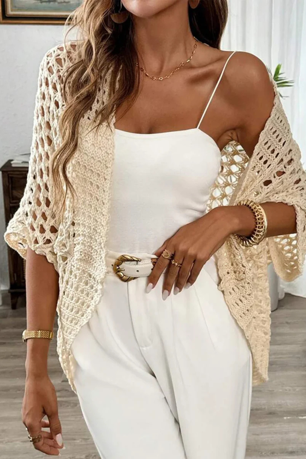 Detailed crochet knit women's short sleeve open front cardigan, adding texture to any outfit.