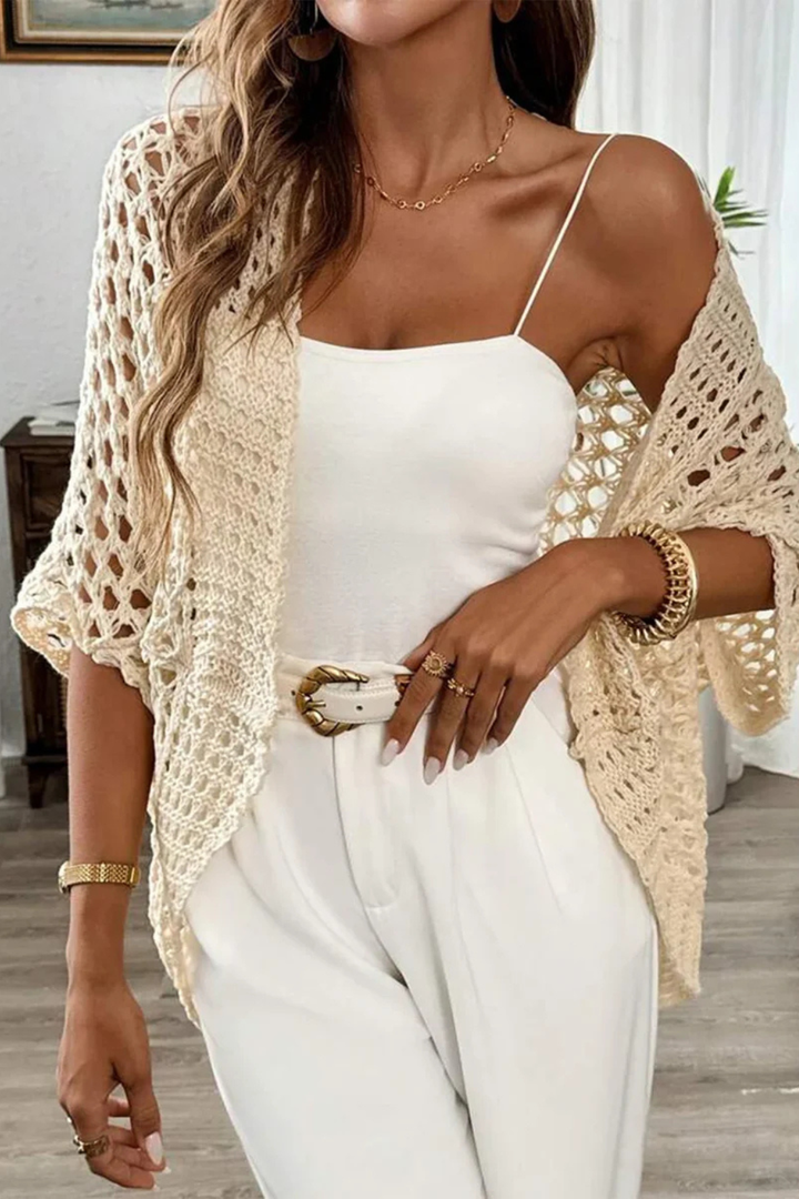 Detailed crochet knit women's short sleeve open front cardigan, adding texture to any outfit.