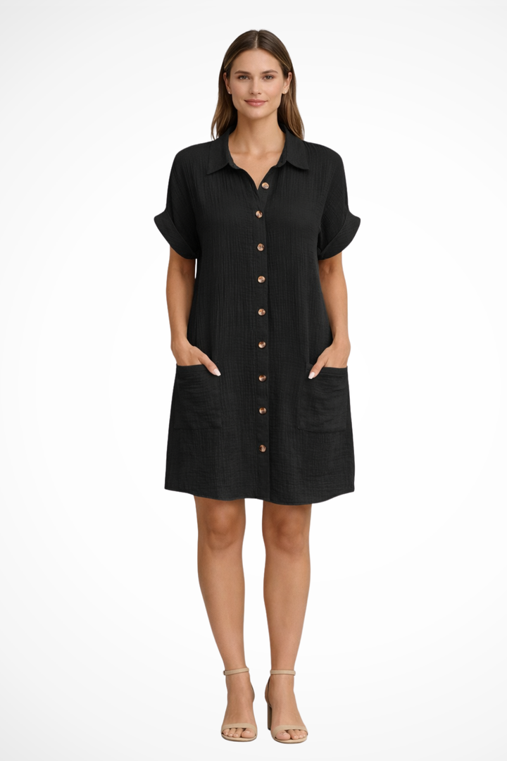 Relaxed fit women's short sleeve button-front day dress, versatile for beach outings or casual summer wear.