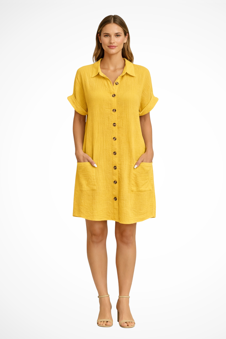 Casual women's flowy short sleeve summer dress with button front, great for warm weather and beach vacations.