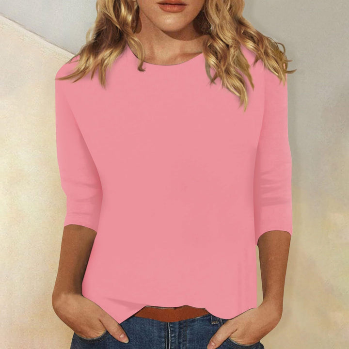 Pullover women's fashion top, three-quarter sleeves, round neck, solid color, casual & versatile.