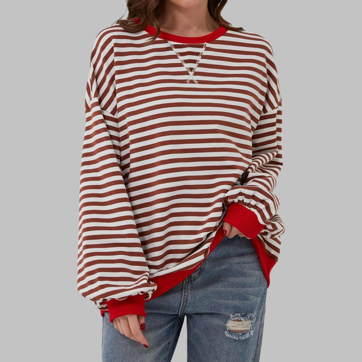 Fashionable women's striped top, long-sleeve and comfy for everyday style.