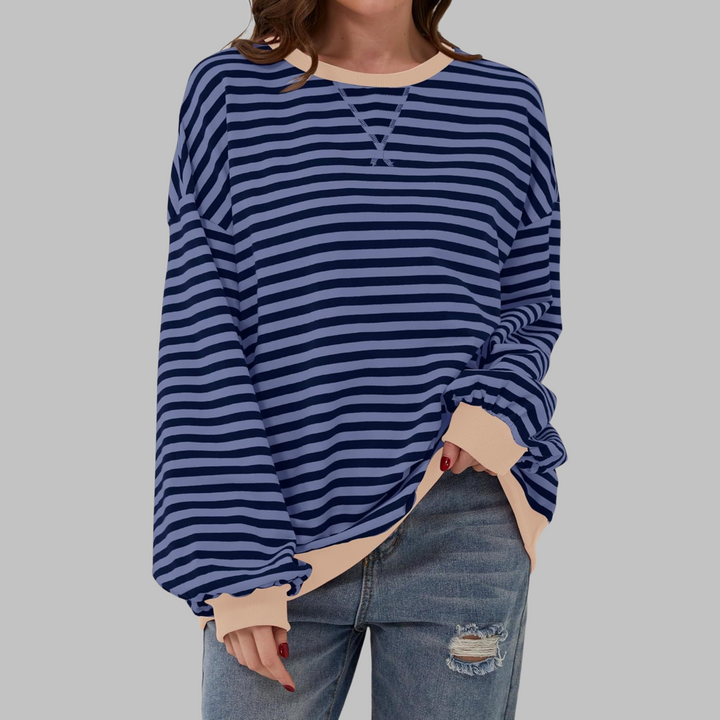 Relaxed fit women's striped sweatshirt, great for casual comfort & layering.
