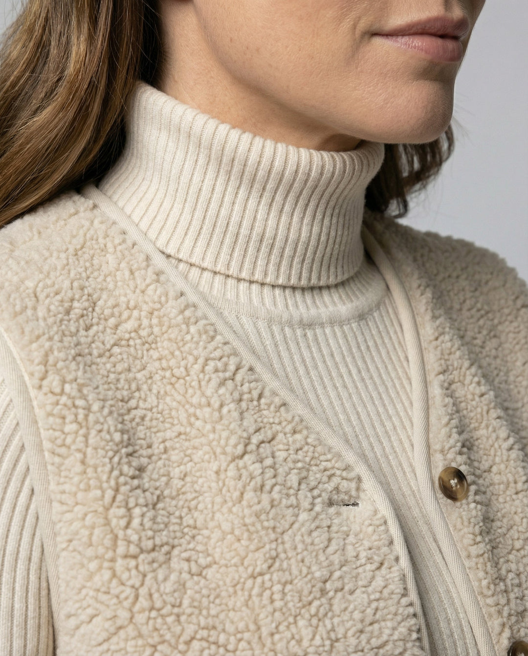 Timeless women's essential in a classic beige, designed for elegant comfort and versatile wardrobe styling.