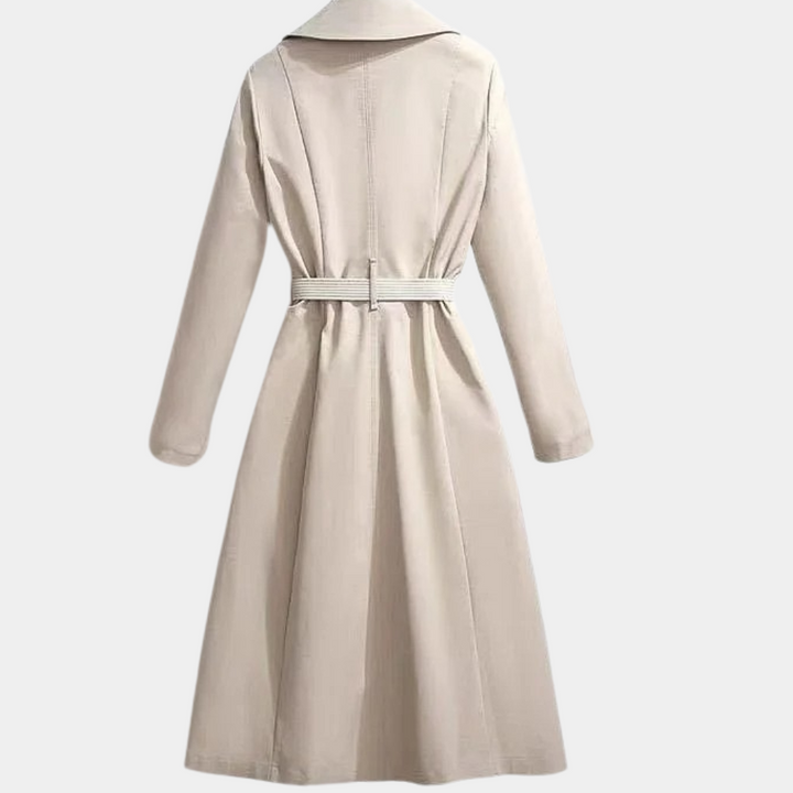Women's elegant beige trench coat for versatile spring & fall fashion. Luxurious classic outerwear.