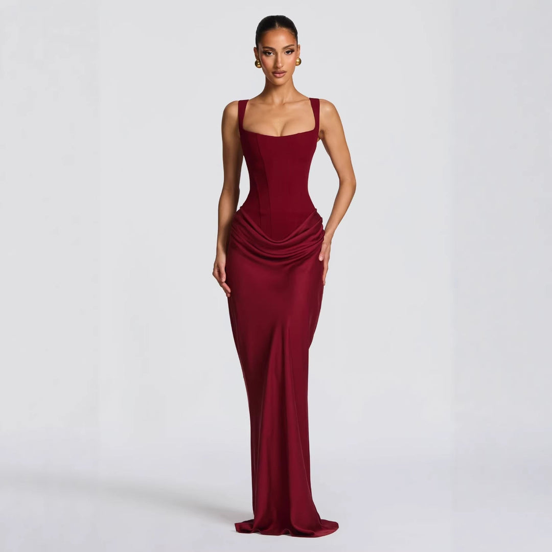 Black fitted maxi dress with elegant deep V-neckline, thin spaghetti straps. Women's long formal party dress.