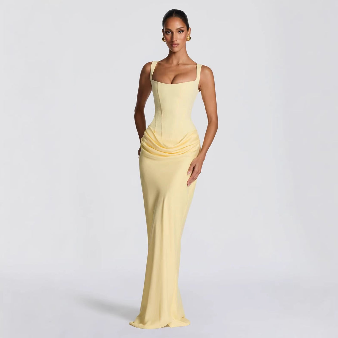 Sleek women's fitted black maxi dress, elegant deep V-neck & spaghetti straps. A sophisticated party/evening gown.