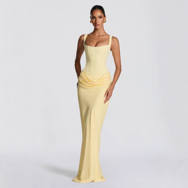 Sleek women's fitted black maxi dress, elegant deep V-neck & spaghetti straps. A sophisticated party/evening gown.