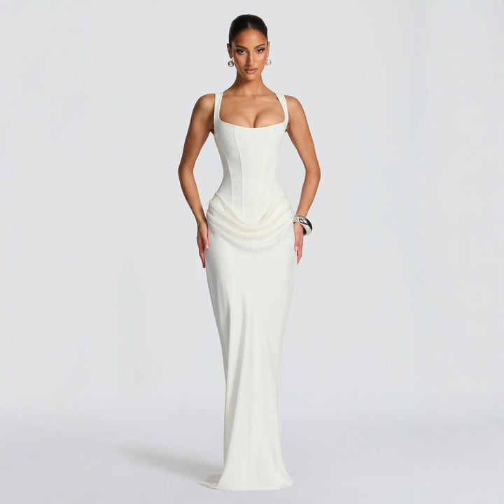 Elegant women's black fitted maxi dress, deep neckline, spaghetti straps. Ideal formal or evening party attire.