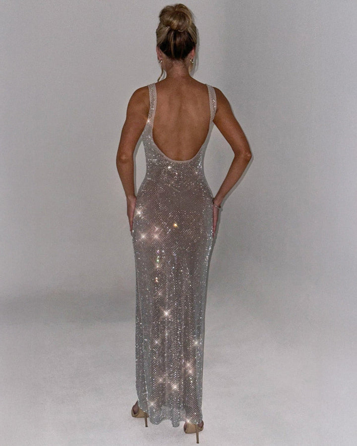 Dazzling women's party dress, a floor-length embellished evening gown.