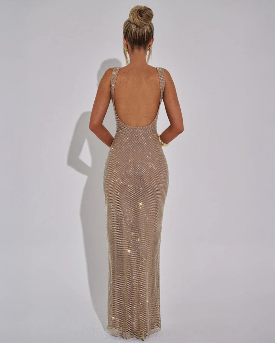 Ruby red embellished evening dress, a luxurious choice for parties.