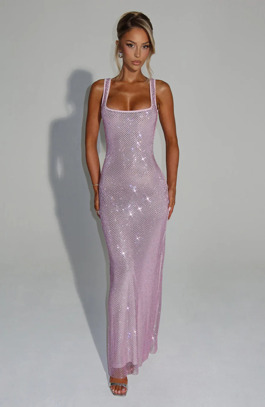Sophisticated black floor-length party dress, perfect for special occasions.