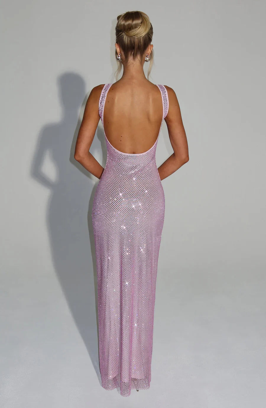 Women's black embellished formal gown, classic and elegant.