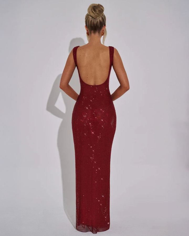 Floor-length embellished maxi dress for a sophisticated special occasion look.