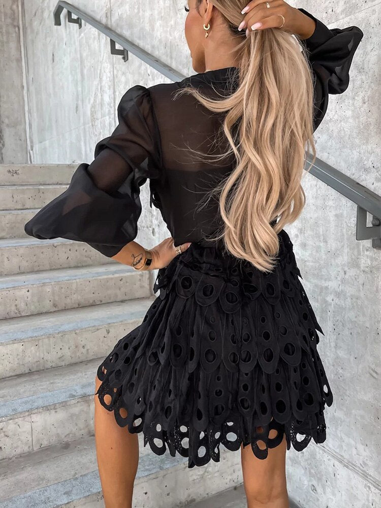 Lightweight women's mini dress with sheer embroidered sleeves and detailed cutwork hem for summer.