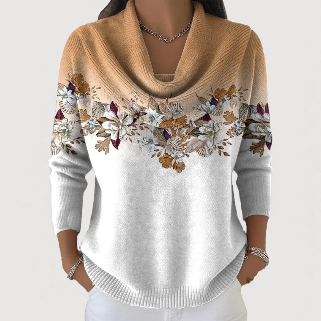 Soft knit women's floral sweater, offering comfortable everyday style & casual chic elegance.