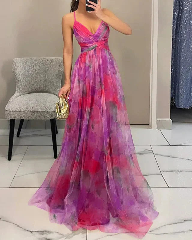 Feminine floral maxi dress for women, spaghetti strap, a-line, elegant summer vacation outfit.
