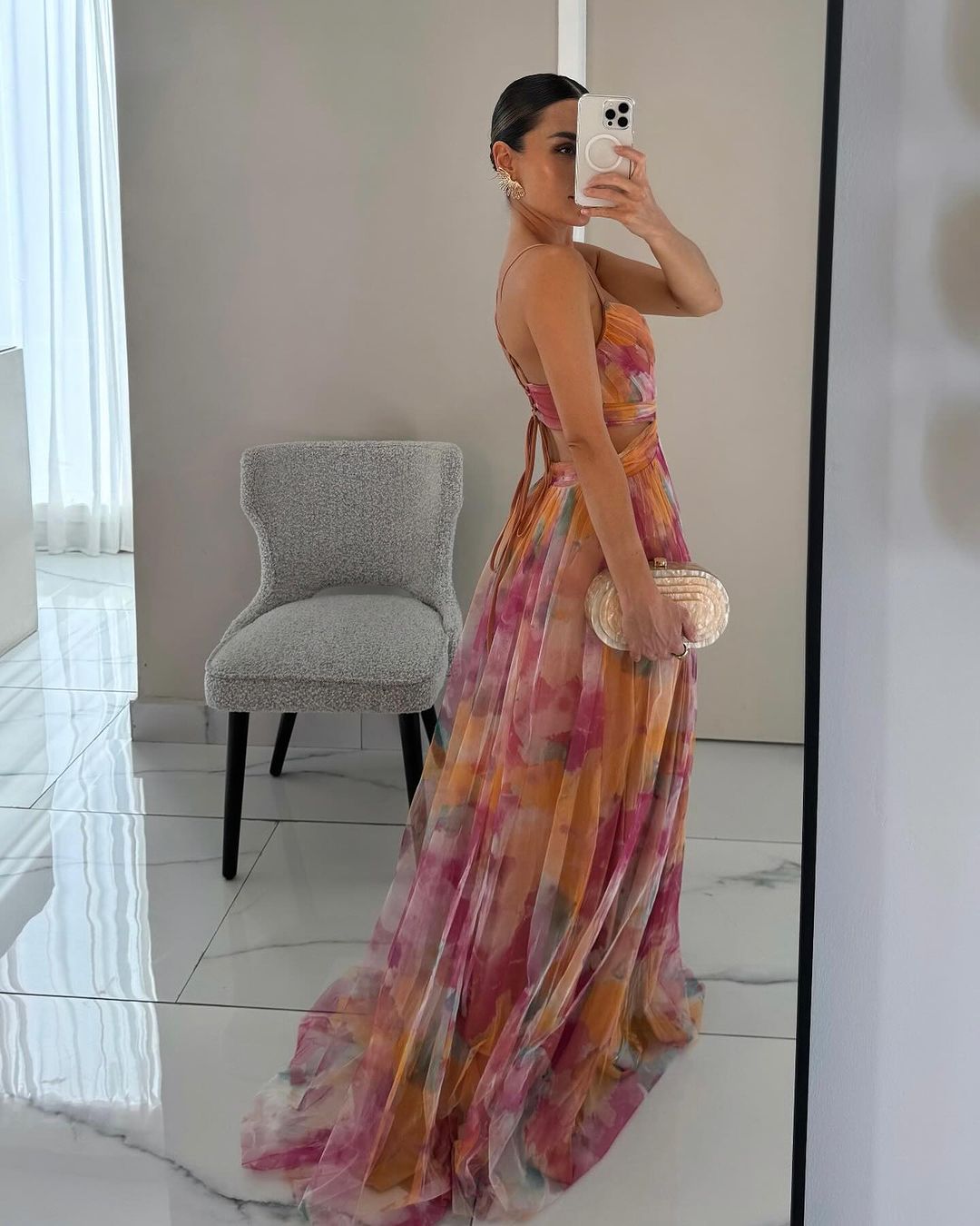 Effortless women's floral maxi dress, spaghetti straps, elegant summer fashion for vacation.