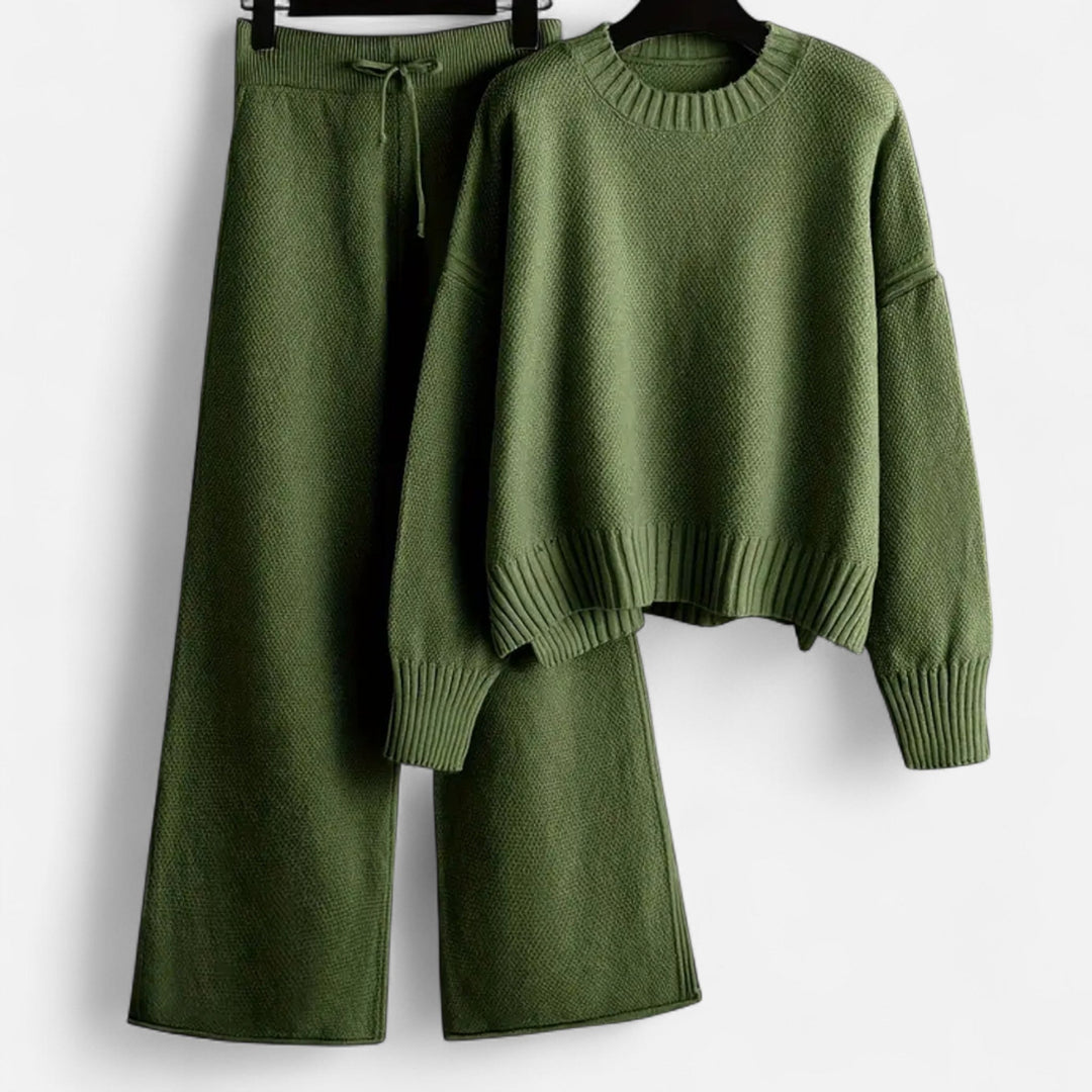 Soft knit women's sweater & wide-leg trouser set, versatile for fall fashion or elegant casual wear.