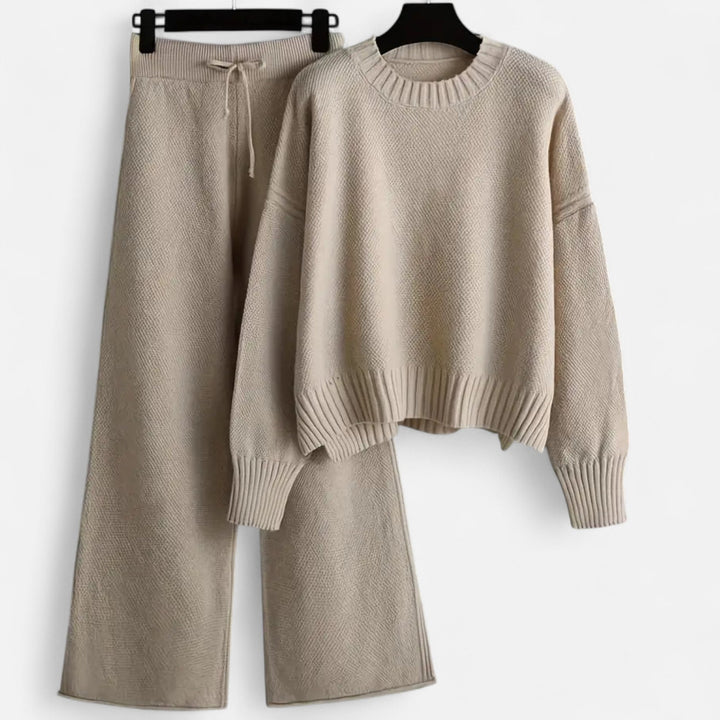 Comfortable women's knit sweater and wide-leg pants set, modern loungewear for autumn and winter.