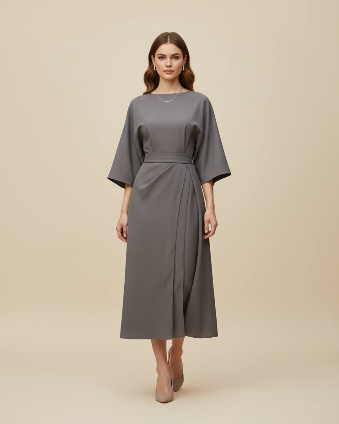 Women's chic midi wrap dress, featuring statement lantern sleeves and a matching fabric belt for a tailored look.