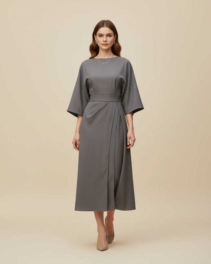 Women's chic midi wrap dress, featuring statement lantern sleeves and a matching fabric belt for a tailored look.