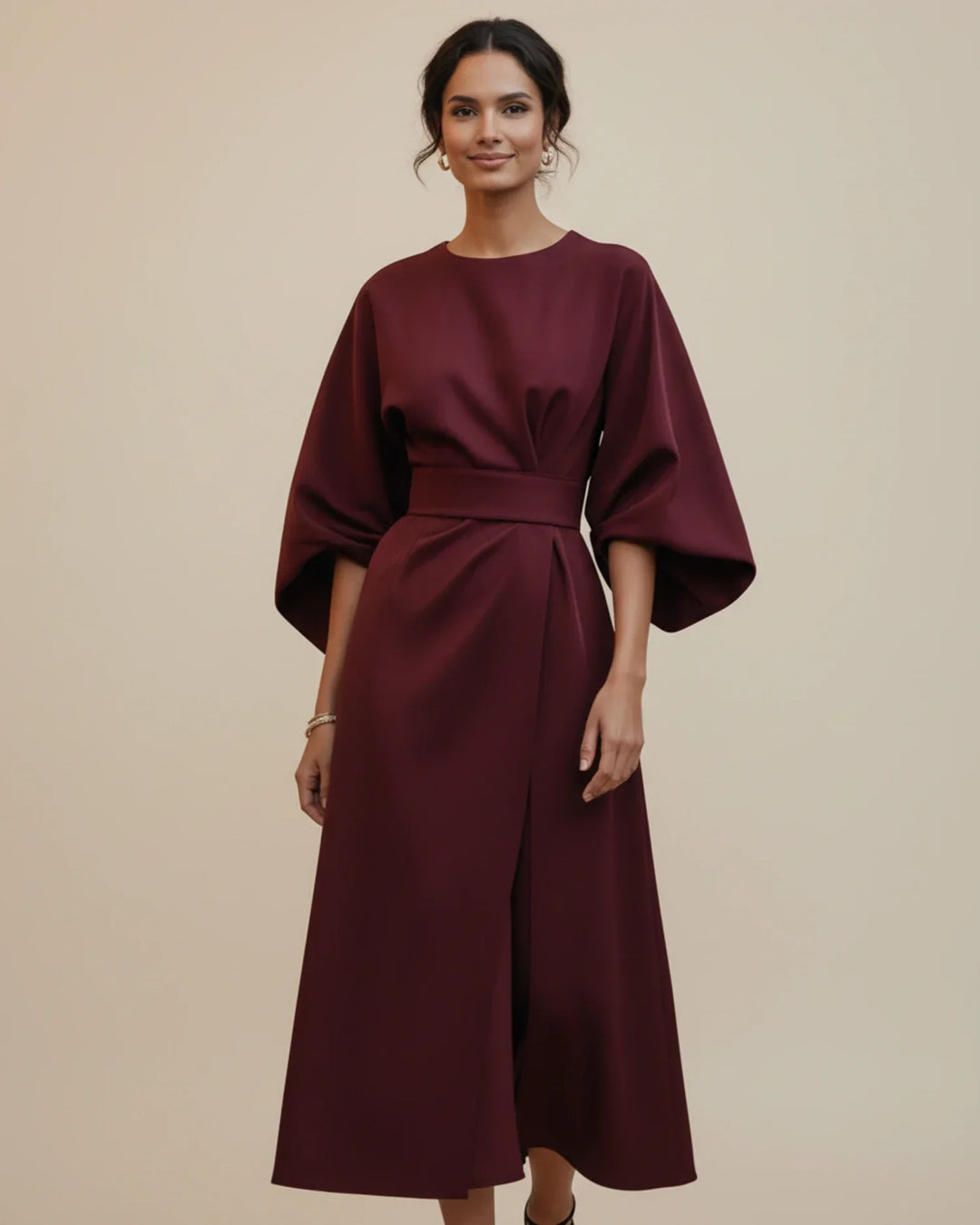 Fashion-forward women's midi wrap dress with bold lantern sleeves and a cinching belt, ideal for events.