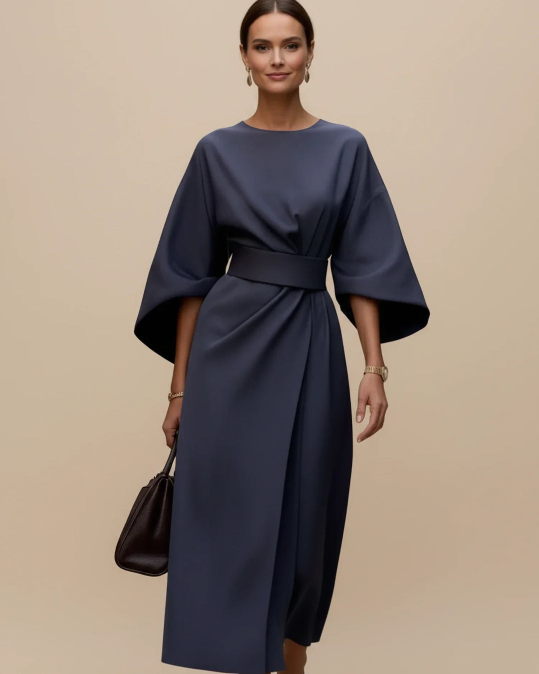 Women's elegant occasion wear midi dress with unique lantern sleeves and a cinched belted wrap.