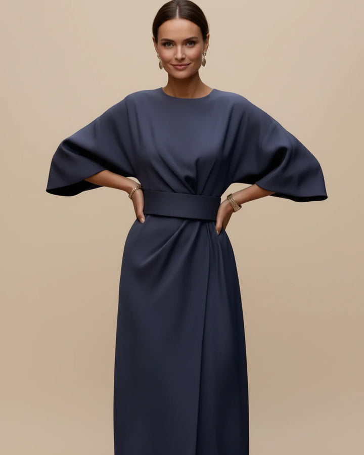 Classic women's wrap midi dress, modernised with elegant lantern sleeves and a chic, adjustable belt.