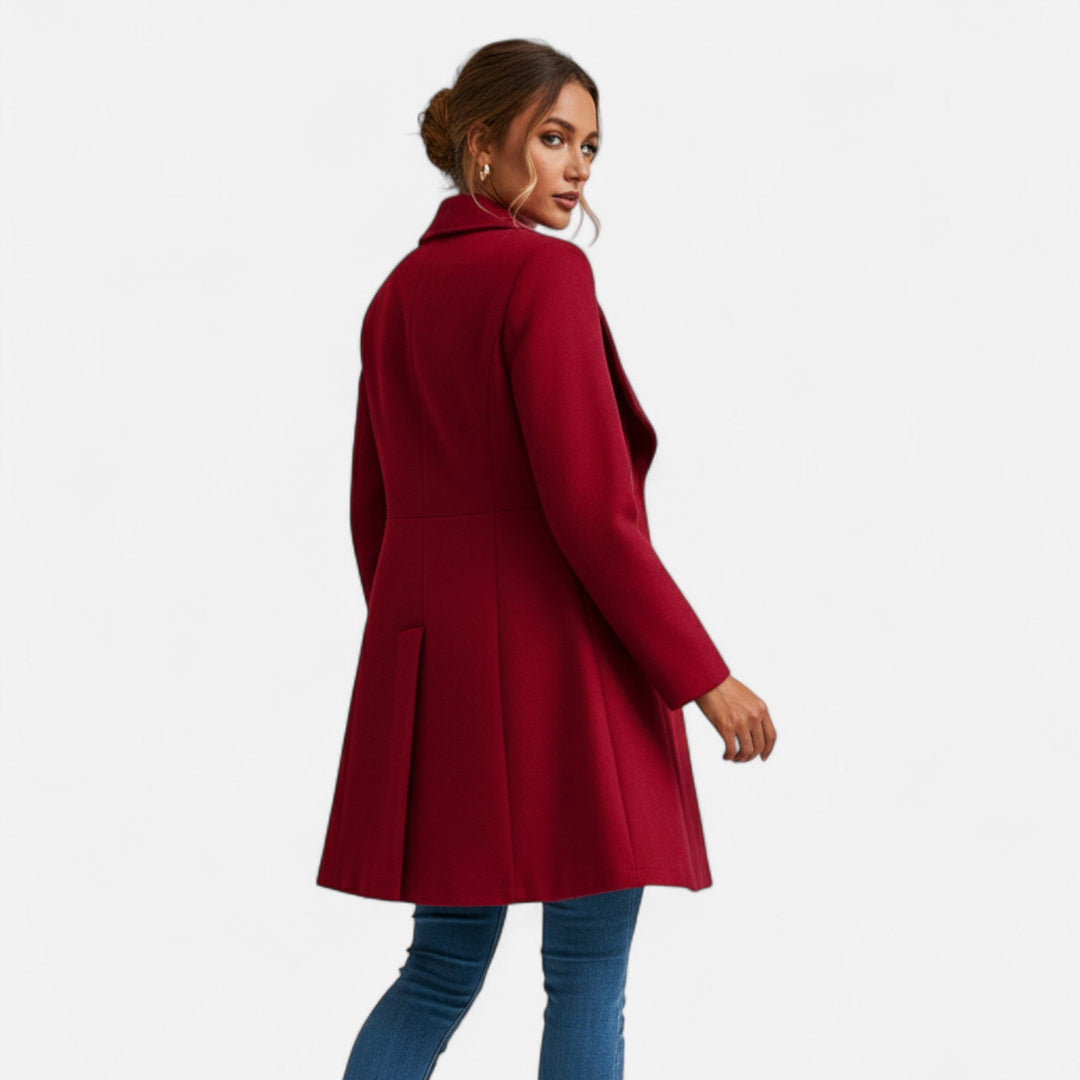 Chic women's winter coat for cold weather, featuring elegant lapels and sophisticated, timeless outerwear.