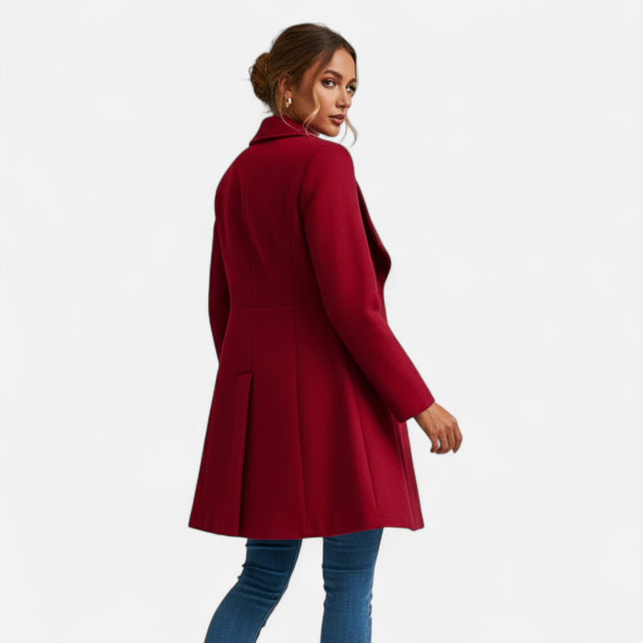 Chic women's winter coat for cold weather, featuring elegant lapels and sophisticated, timeless outerwear.