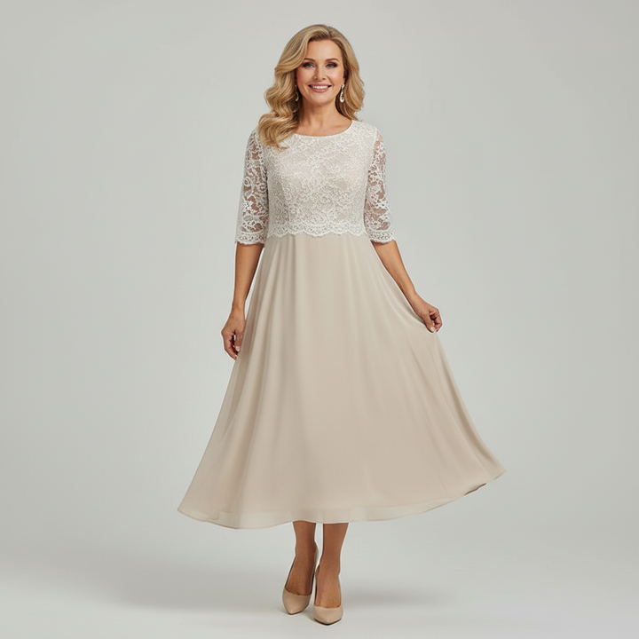 Chic women's occasion midi dress with intricate lace bodice and three-quarter sleeves, great for wedding guests.