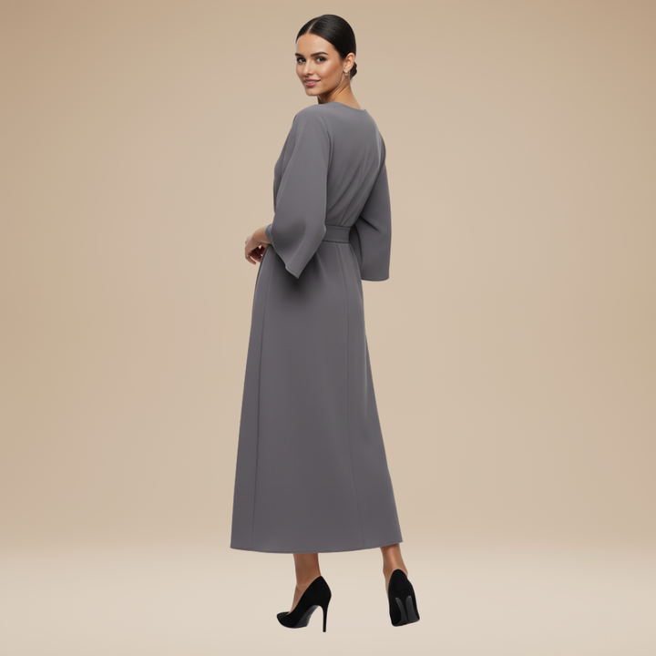 Stylish women's belted midi wrap dress with wide sleeves, a versatile elegant choice for all seasons.