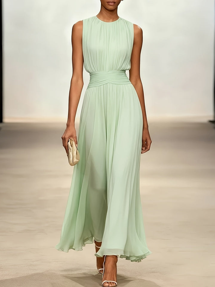 Formal occasion dress: sleeveless pleated maxi with a sophisticated ruched waist, perfect for parties.