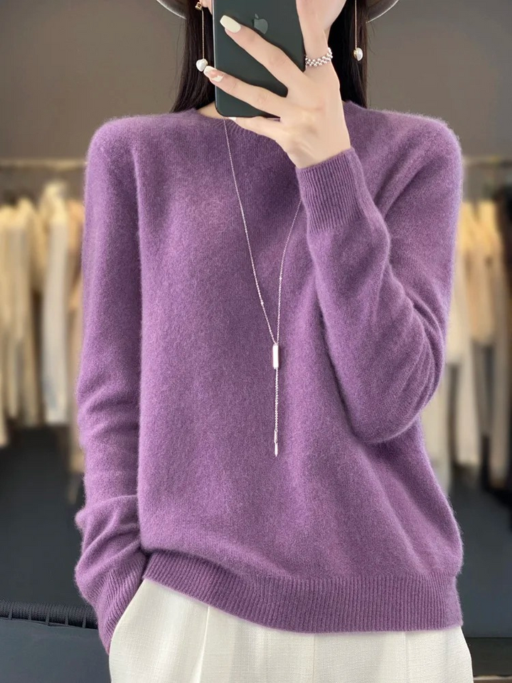 Stylish women's round neck knit pullover. Elegant long sleeve top, comfortable & versatile fashion.