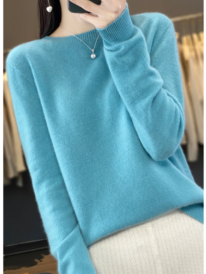 Versatile women's round neck knit sweater. Elegant fall fashion essential, soft & stylish.