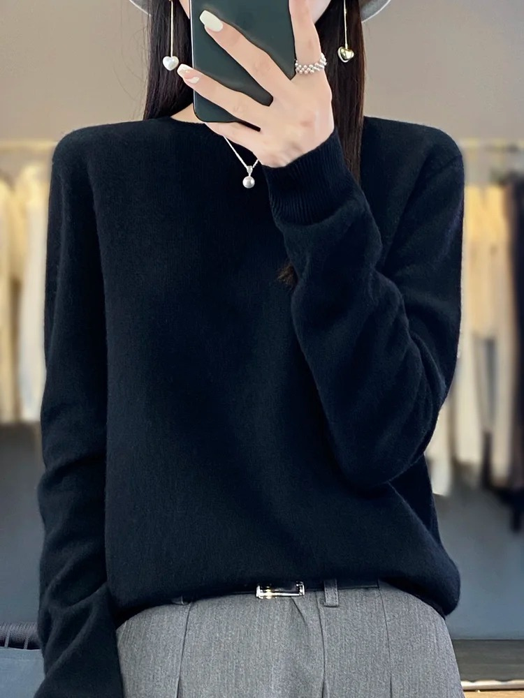 Elegant women's fall sweater. Round neck, soft knit, versatile long sleeve top for women.