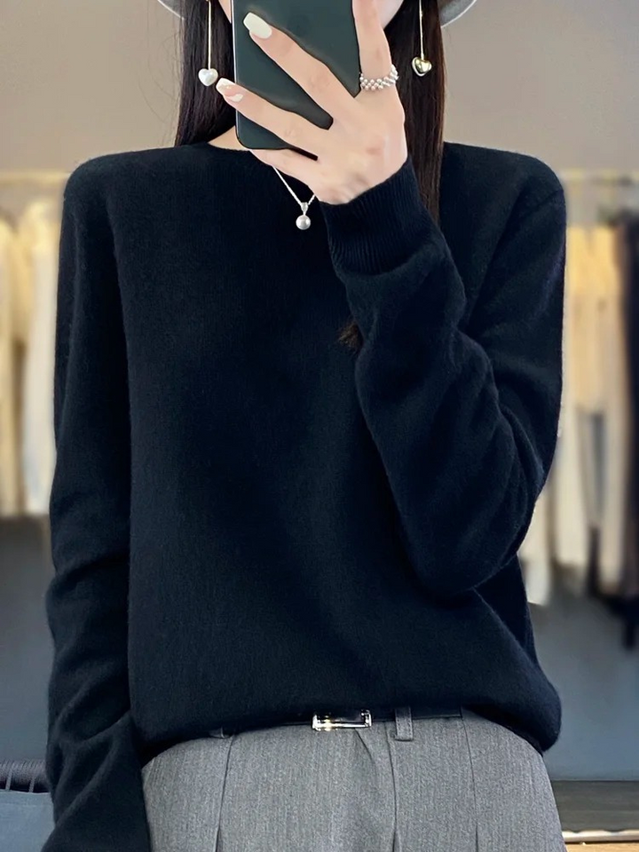Elegant women's fall sweater. Round neck, soft knit, versatile long sleeve top for women.