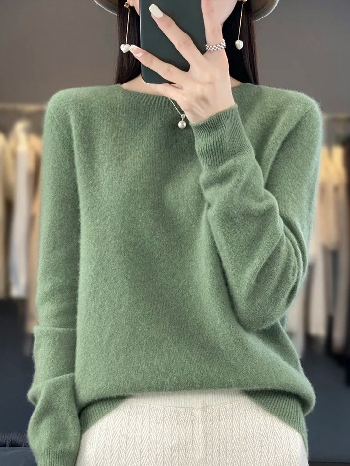 Chic women's knitwear. Soft long sleeve round neck sweater, comfortable & fashionable for any occasion.