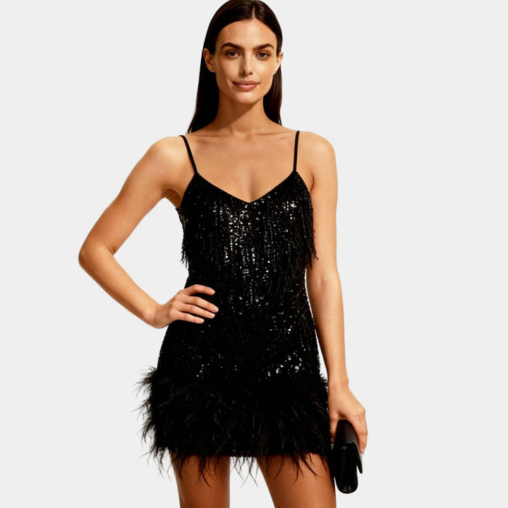 Women's elegant sequin mini party dress with stylish feather trim and delicate spaghetti straps.