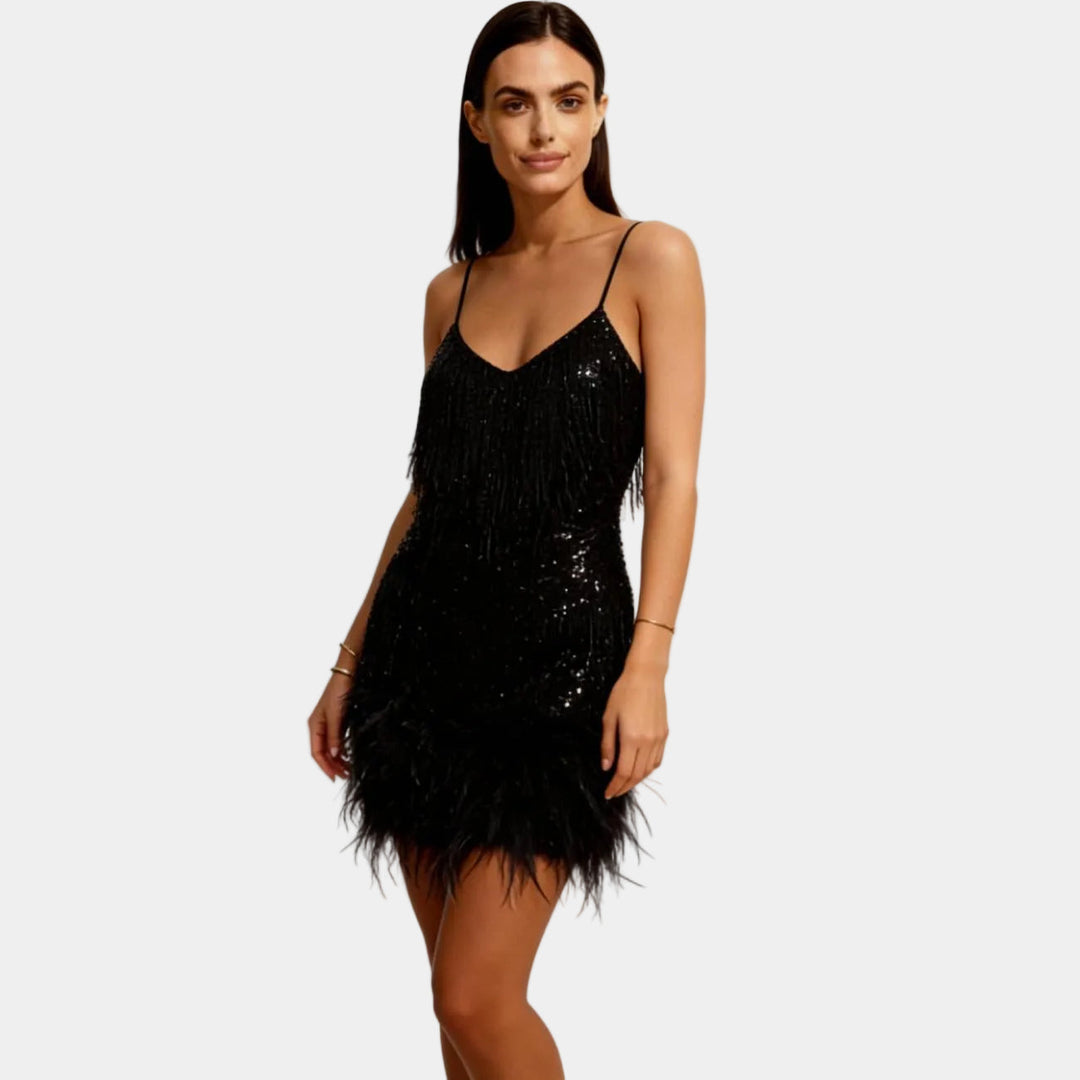 Sparkling women's sequin and feather mini party dress, designed for a stunning and memorable look.