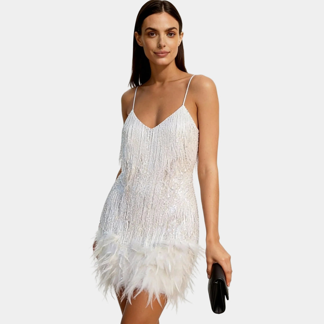 Sophisticated women's sequin mini dress with luxurious feather trim, perfect for any special occasion.