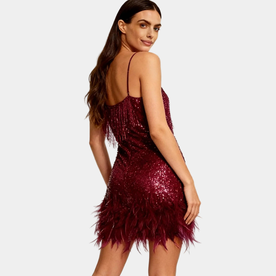 Stylish women's feather trim sequin mini dress, an elegant and vibrant option for parties.