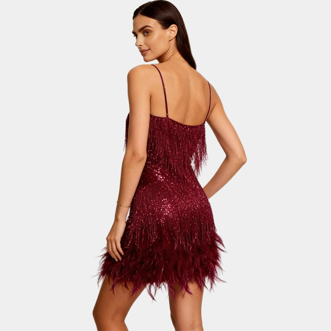 Women's exquisite sequin feather mini party dress, offering a glamorous silhouette for evening wear.